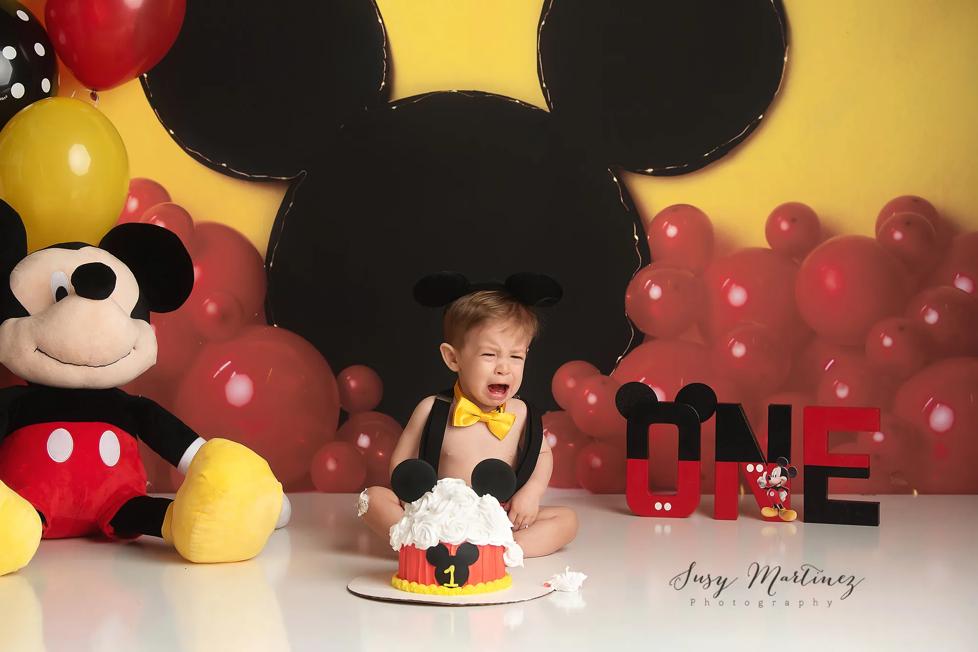 baby cries during First Birthday Cake Smash in Las Vegas