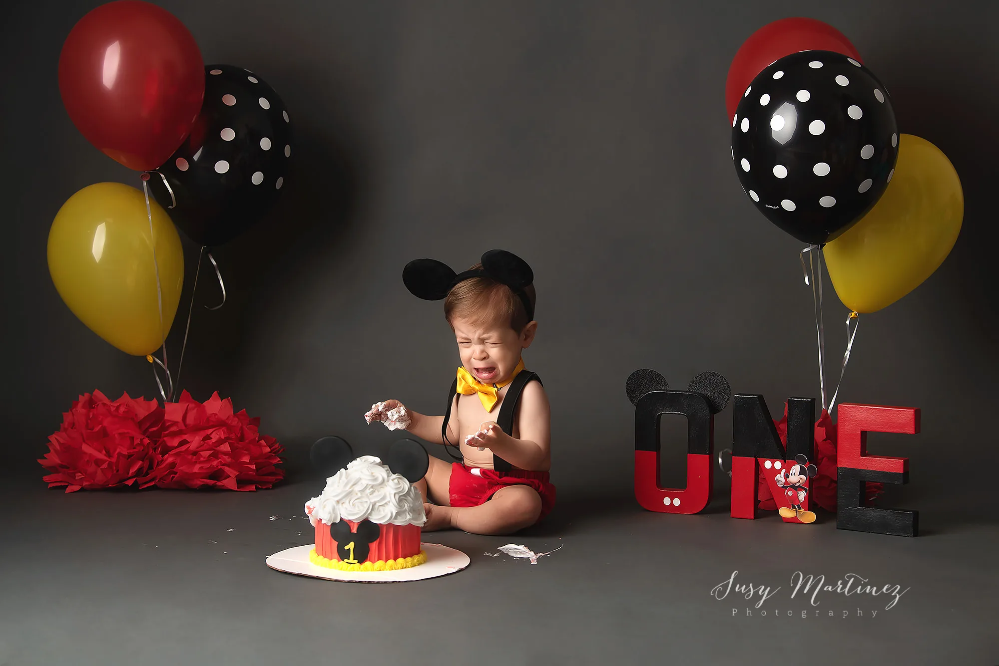 little boy cries during First Birthday Cake Smash in Las Vegas