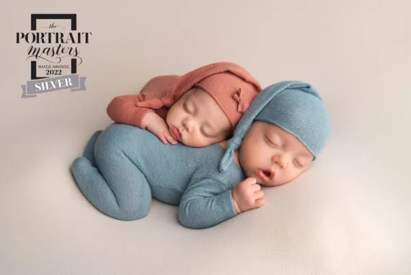 newborn twins lay together on bean bag during Las Vegas Studio newborn portraits