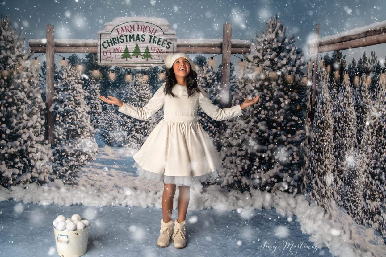 Girl on snowy scene dancing in the snow